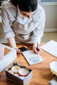 Small shop owner at work, local SEO explained for small businesses