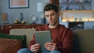 Visitor using a tablet to fill in a simple contact form